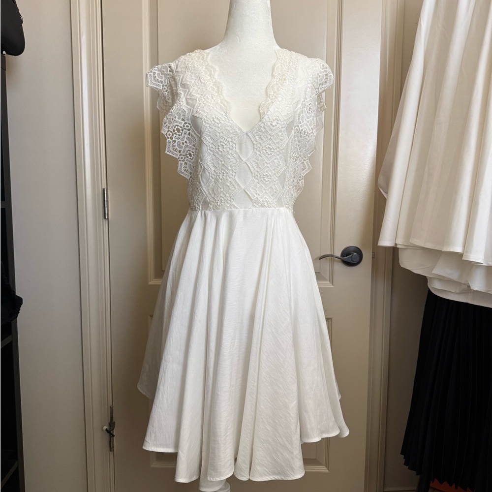 Sandro White Mini Dress with Chic Design